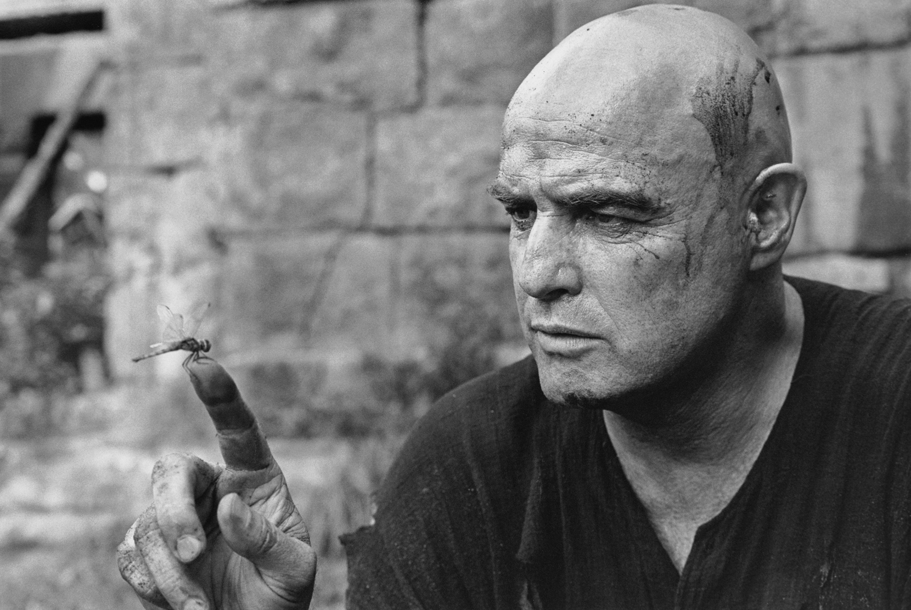 MEM©Marlon Brando, Apocalypse Now,1976 Marlon Brando fascinated by a dragonfly, Apocalypse Now, Pagsanjan, Philippines, 1976
